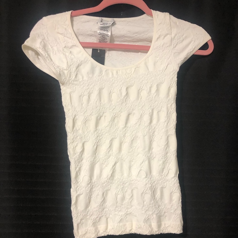 Pretty petite Bebe top. Size S. New , never worn.